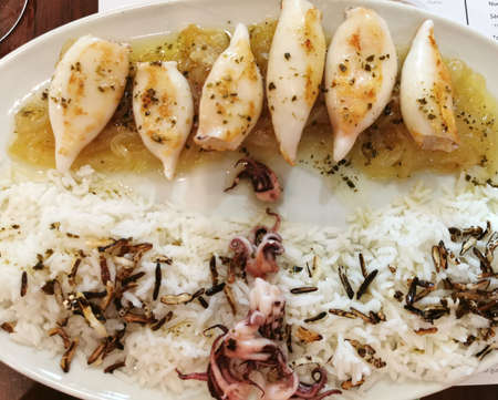 baby squid with grass and onion caramel sauce with fried rice