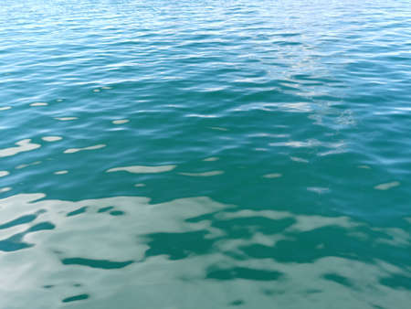 Blue water surface in sunny day