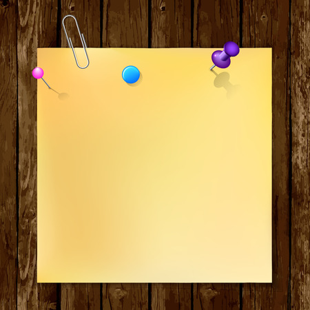 Note paper with metal paper clip, violet, blue and pink push pins on wood background.のイラスト素材