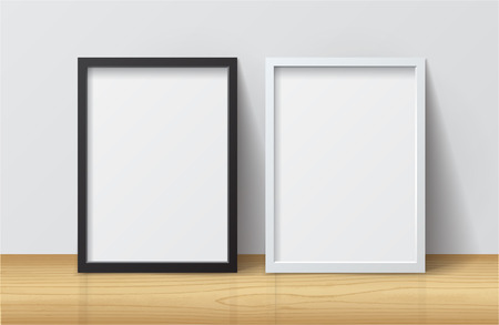 Realistic White and Black Blank Picture frame, standing on Light Wood Floor atWhite Wall from the Front. Design Template for Mock Up.のイラスト素材