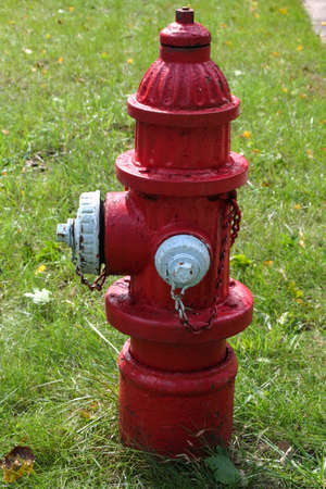 Picture of a red and white fire hydrant taken on a sunny day in Madison Wisconsin.の写真素材