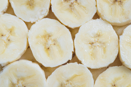 Background close up slices of juicy ripe bananaの写真素材