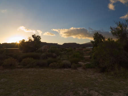 Sunset with light effect in arid plain in South Africaの写真素材