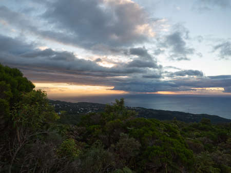 Viewpoint on the west coast at sunset in Reunion Island from Colorado parkの写真素材