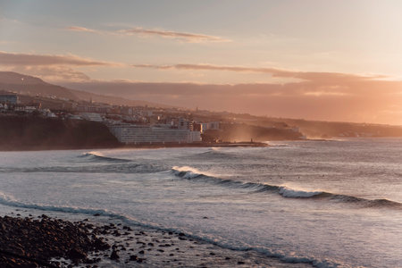 Magic sunset on Bajamar for a surf session with good waves in Tenerife in the Canary islandsの写真素材