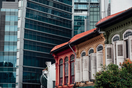 The surprising mix of modern and ancient architectures in Singaporeの写真素材