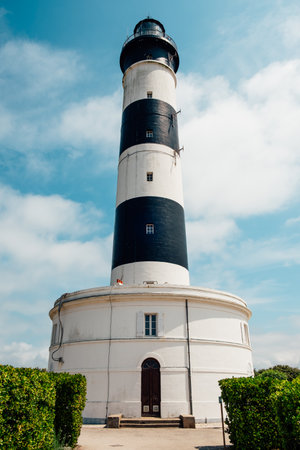 The lighthouse of Chassiron under a bright sky of Summer in the Oleron islandの写真素材