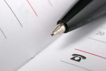 jotter and pen. The Notebook with a black ball pen
