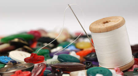 Needle and a thread. A set of accessories for sewing.