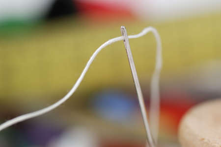 Needle and a thread. A set of accessories for sewing.の写真素材