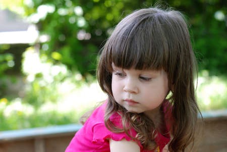 Portrait of the girl. Caucasian the child with brown eyesの写真素材