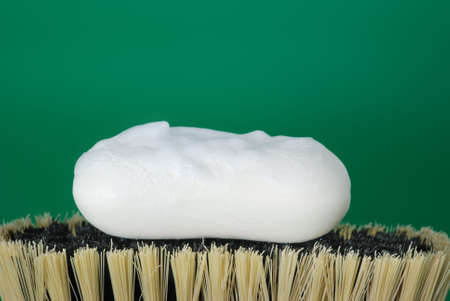 Brush for cleaning. The wooden handle, a natural bristleの写真素材