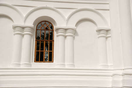 Arch window. A window in an ancient building with columnsの写真素材