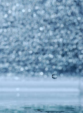 A water table with effective drops stains on waterの写真素材