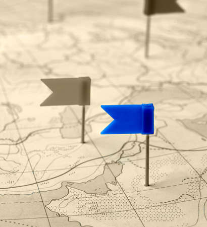 Flag a pin. A label on a planimetric mapの写真素材