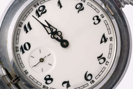 Analog hours, time it is established at 12 o'clock. A photo close upの写真素材