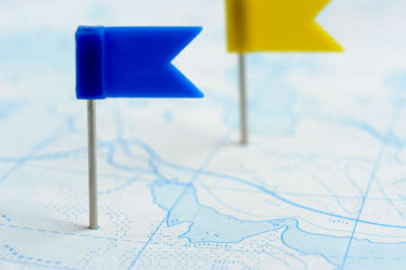 Flag a pin. A label on a planimetric mapの写真素材