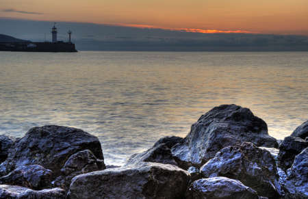 lighthouse. Means of the equipment of sea ways in the form of a capital construction of tower type. Crimea, Ukraineの写真素材