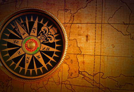 Old compass and map background. Old gold color