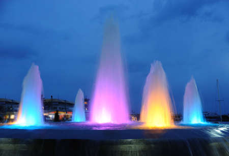 Color fountain. A night photo, light from street lanternsの写真素材