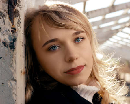 The blonde with blue eyes. An open-air on outdoorsの写真素材