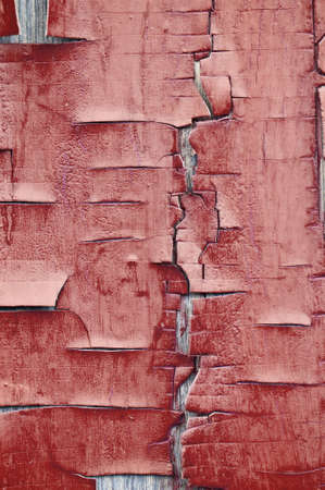 Fence with an old paint. A fragment of the peeled off paint from an old fenceの写真素材