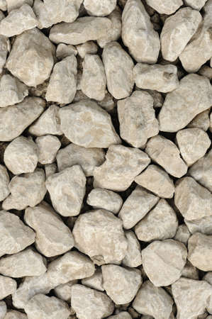 Rock background. A structure of stones, rocky breeds