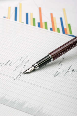 Business a theme. Diagrams from the share market, pens. Concept - exchange activityの写真素材