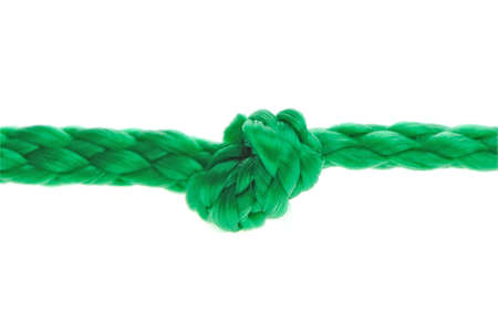 Knot on a cord. Isolated on a white background