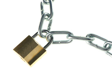 The lock with chain. The lock of gold color closing chainの写真素材