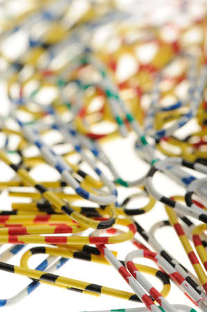 Color paper clips. Office subject it is isolated on a white backgroundの写真素材