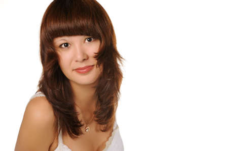 The beautiful girl on a white background. The Asian nationalityの写真素材