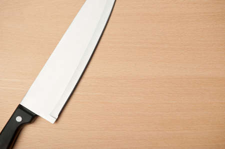 Knife and board for cutting food. Studio shooting.の写真素材