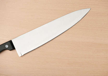 Knife and board for cutting food. Studio shooting.の写真素材