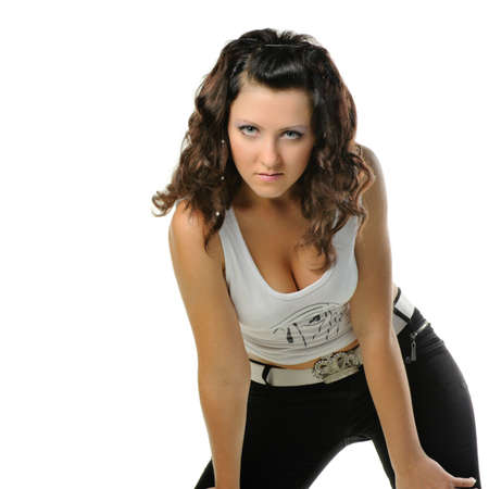 The beautiful girl isolated at white. A portrait of the beautiful girl of the European appearanceの写真素材