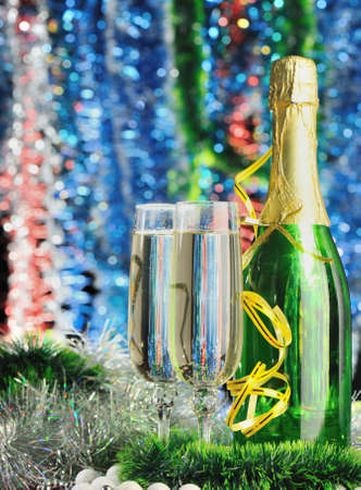 Glasses of a champagne. A christmas drink on the dim color backgroundの写真素材