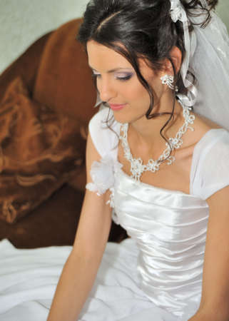 The beautiful bride. The young girl in a wedding dress.の写真素材