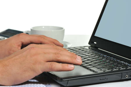 Workplace of the businessman. Laptop in an environment of financial calculationsの写真素材