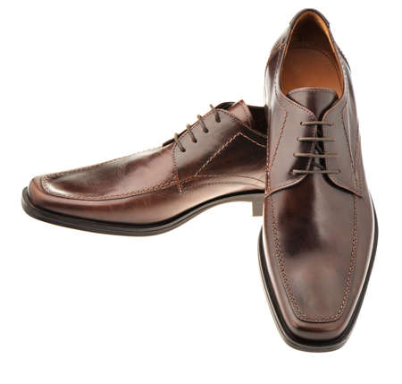 Pair a shoe a brown leather. Man's shoes isolated on a white backgroundの写真素材