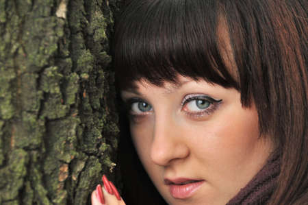 The girl in an autumn forest. The European appearanceの写真素材