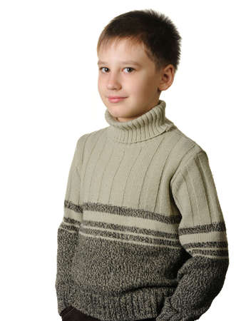 Portrait of the boy. Age of 7 years. It is isolated on a white backgroundの写真素材