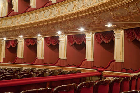 Theatrical armchairs. An interior of opera theatre. Odessa, Ukraineの写真素材