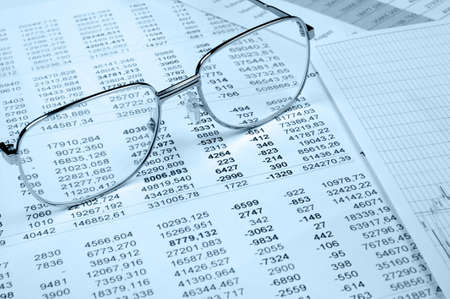 The financial report. A workplace of the financier. Blue toneの写真素材