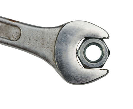 Wrench with a nut. It is isolated on a white backgroundの写真素材