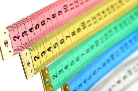 Measuring tape of the tailor. Abstract color background