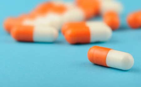 set capsules on blue background. Photo closeupの写真素材