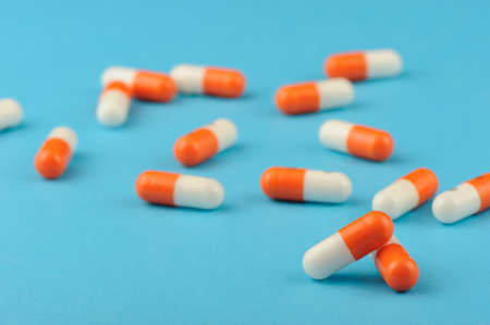 set capsules on blue background. Photo closeupの写真素材