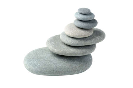 Balance. A construction from a pebble. It is isolated on a white backgroundの写真素材