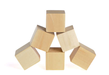 construction from wooden cubes. It is isolated on a white backgroundの写真素材