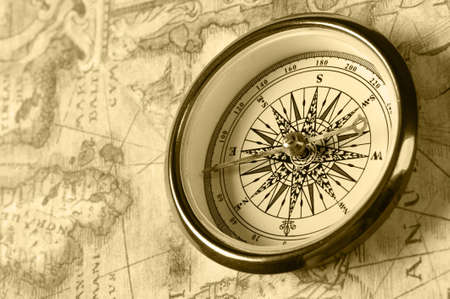 Old compass on ancient map. Old monochrome imageの写真素材